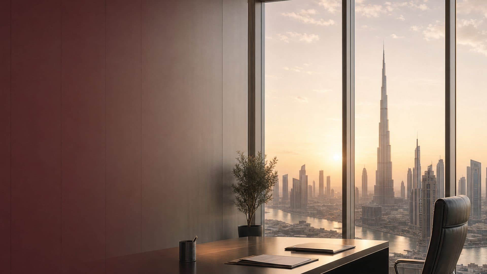 Executive office overlooking the Dubai skyline at sunset